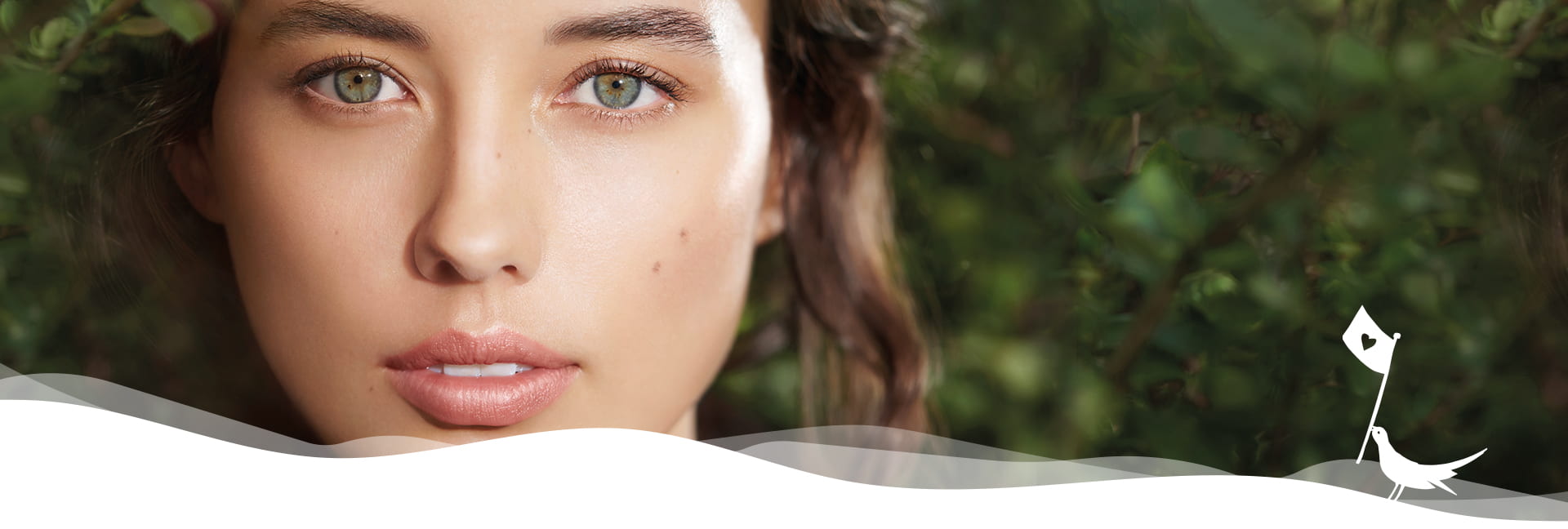 a close up look of a green eyed woman